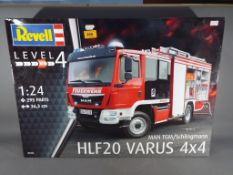 Revell - MAN TGM/Schlingmann HLF20 Varus 4x4 1:24 scale Level 4 model #07452, 295 parts,