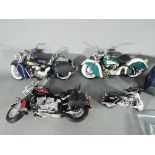 Guiloy - a quantity of diecast and plastic motorcycles by Guiloy with a bag of loose parts,