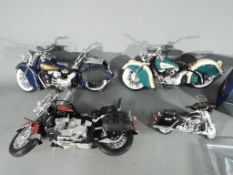 Guiloy - a quantity of diecast and plastic motorcycles by Guiloy with a bag of loose parts,