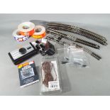 A small quantity of Hornby 2-rail OO gauge track, a Hornby controller,