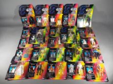 Kenner, Star Wars - 27 modern Kenner Star Wars 3 3/4" figures on Green or Orange Cards .