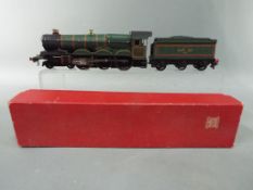 Hornby - An OO gauge Hornby Dublo 2 rail, Castle Class steam locomotive and tender, # 2220,