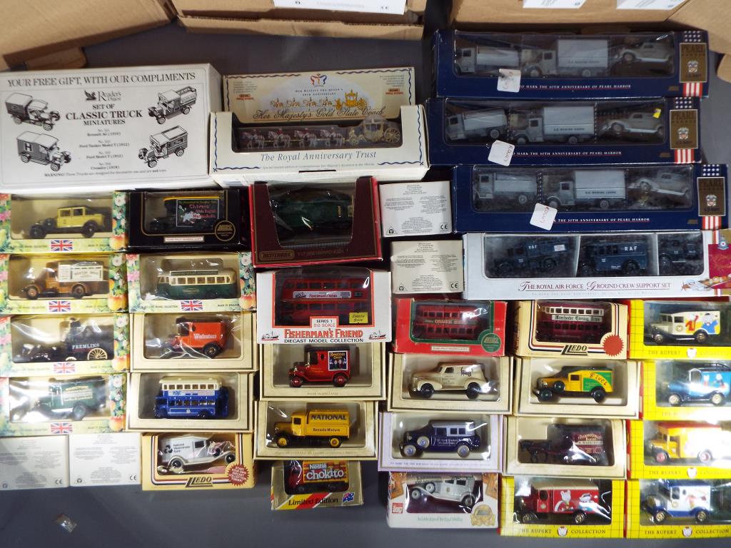 A collection of diecast model vehicles and vehicle sets by Lledo, Matchbox and similar.