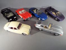 Burago, Maisto - six 1/18 scale models to include Jaguar E type, Jaguar MK2, Jaguar XK,