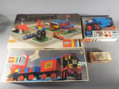 Lego - Three boxed vintage Lego sets with a home made box containing Lego parts.