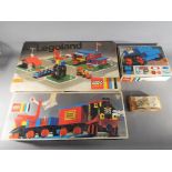 Lego - Three boxed vintage Lego sets with a home made box containing Lego parts.