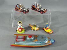 Corgi, Ertl and Others - A group of 6 diecast and tinplate models.