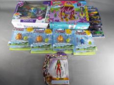 A mixed lot of factory sealed models and figurines to include four Cartoon Network Adventure Time