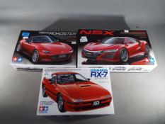 Tamiya Japan - three Tamiya Japan 1/24 Sports Car Series model cars to include Honda NSX #344,