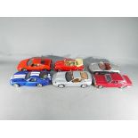 Six unboxed diecast model motor vehicles to include Maisto, Bburago / Burago and Mira.