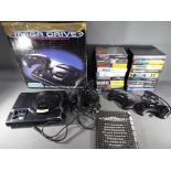 Sega - A boxed Sega Mega Drive games console with two controllers,