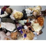 Dolls - a large quantity of modern dressed dolls with some stands,