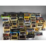 Corgi, Lledo, Matchbox, Dinky - In excess of 30 boxed diecast model cars.