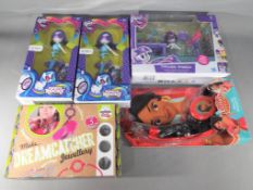 Hasbro - a mixed lot of toys in factory sealed boxes to include three Hasbro Equestria Girls