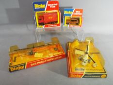 Dinky - four mint Dinky toys in blister packs and window boxes to include #732 Bell Police
