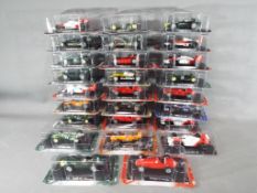 Formula 1 Race Cars - 26 blister packs of Formula 1 race cars to include Renault, Lotus and similar,