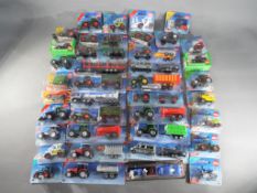 Siku - Approximately 38 diecast carded and boxed diecast model vehicles by Siku in various scales