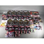 A mixed lot to include nine Saban's Power Rangers Alpha 5 figurines in factory sealed window boxes,