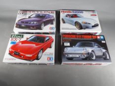 Tamiya Japan - four Tamiya Japan 1/24 sport car series model cars to include Efini RX-7,