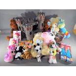A mixed lot of toys to include plastic castle model,