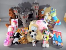 A mixed lot of toys to include plastic castle model,