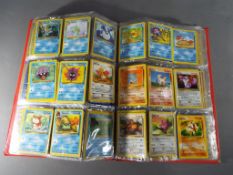 A Pokémon file containing a large quantity of Pokémon cards, in excess of 300 cards.