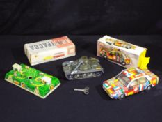 Jaya, Gescha and Other - Three vintage tinplate vehicles.