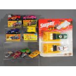 Matchbox - A collection of 9 predominately boxed / carded Matchbox diecast model vehicles.