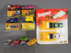 Matchbox - A collection of 9 predominately boxed / carded Matchbox diecast model vehicles.