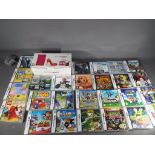 Nintendo - A boxed Nintendo DSi hand held games console and a quantity of games,