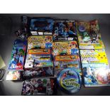 A mixed lot to include four Pokemon magazines 2019 with factory sealed free gifts in blister packs,