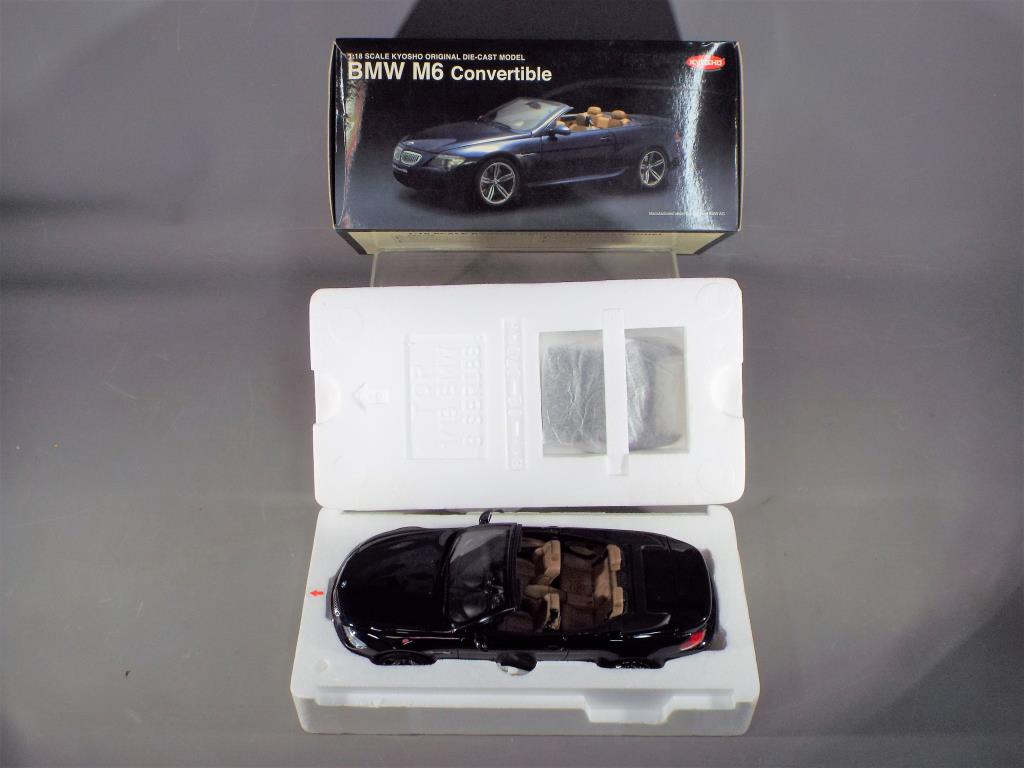 Kyosho - A boxed 1:18 scale Kyosho 08704BL BMW M6 Convertible in blue. - Image 2 of 2