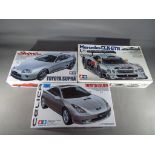 Tamiya Japan - three Tamiya Japan 1/24 Sports Car Series model cars to include Toyota Celica