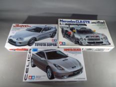 Tamiya Japan - three Tamiya Japan 1/24 Sports Car Series model cars to include Toyota Celica