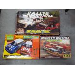 Scalextric - Three boxed Scalextric sets.