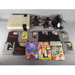 Nintendo - A Nintendo NES games console with four controllers and twelve games cartridges including