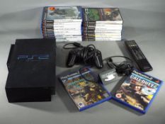 Sony - An unboxed Sony Playstation 2 games console with controller and accessories,