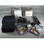 Sony - An unboxed Sony Playstation 2 games console with controller and accessories,