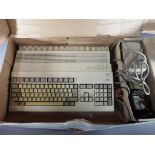 Commodore - A boxed Commodore Amiga 500 personal computer.