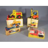 Dinky Toys - A collection of Four boxed diecast model vehicles by Dinky Toys.