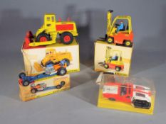 Dinky Toys - A collection of Four boxed diecast model vehicles by Dinky Toys.