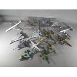 Corgi, Ertl, Dinky and Others - 14 predominately unboxed diecast model aircraft in various scales.