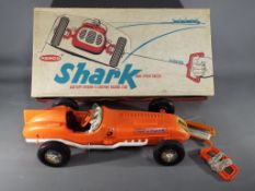 Remco - A boxed Remco Shark Battery Driven U-Control Racing Car.