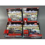 Micro Machines - four mint blister packs of Hasbro Micro Machines racing sets to include 1,