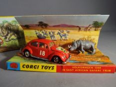 Corgi Toys - A boxed Corgi 256 Volkswagen 1200 "East African Safari" The model is in orange and is