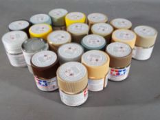 Tamiya - twenty Tamiya Color 10ml jars of acrylic paint - a mix of various colours.