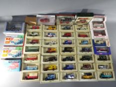 A collection of boxed diecast model vehicles to include Days Gone, Matchbox, Dinky by Matchbox,