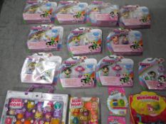 Unused Retail Stock - A quantity of boxed Power Puff Girls figures and two boxes of Num-Noms,