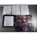 Four binders containing a quantity of trading / collector cards to include Magic The Gathering,