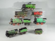 Hornby - A collection of six Hornby O gauge clockwork locomotives, some with tenders.